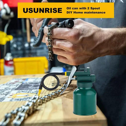 Green Metal Oil Can Set With Two Complete Sets Of Spouts For Precision Oiling Of Machinery And Automotive Parts on workbench
