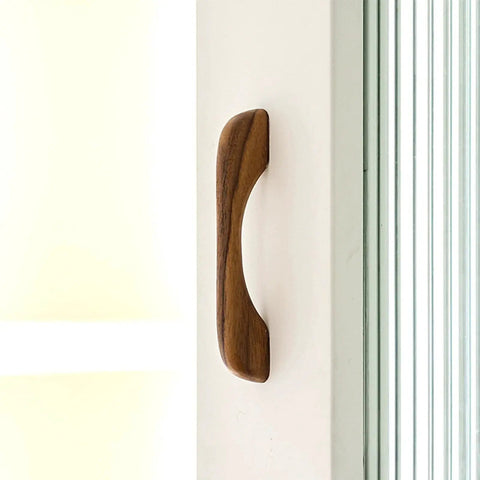Two Solid Wood Dark Walnut Cabinet Pulls 126mm Overall Length 96mm Center to Center Mounting 12mm Width on a door side view