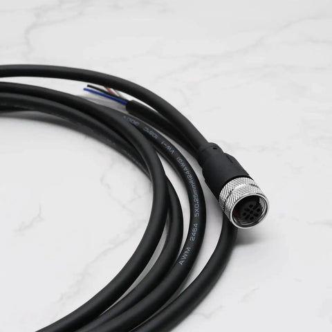 M12 5 Pin Straight Aviation Connector Cable with TPU jacket, female to female, waterproof, industrial use on marble surface.