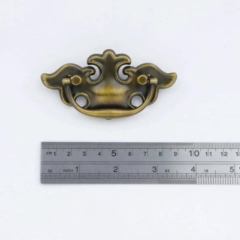 Antique Brass Ring Pull Handles For Cabinets And Drawers, Vintage Drop Ring Knobs With Screws, shown with measuring ruler for size