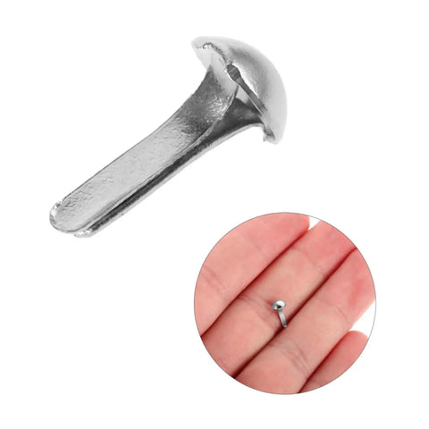 Close-up of 100 Pcs Diy Iron Brads For Puppet Making Kit Mini Fasteners for Kids Crafts shown in hand and individually.