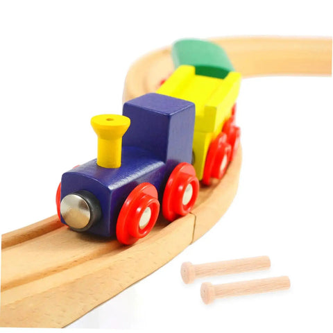 Miniature Wooden Nails Set For Dope Crafting And Woodworking With Solid Wood Rods next to a wooden toy train on a track