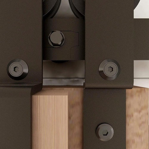 Close-up of metal components of the Beefy 11Ft Bypass Barn Door Hardware Kit For 66 Inch Double Doors with industrial grade steel.