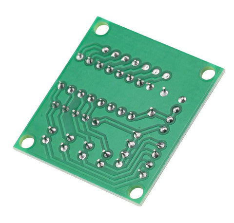 Bottom view of a green ULN2003 driver board for 28BYJ-48 stepper motor with four mounting holes.