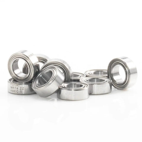 Beefy Ten Pack Shielded Miniature Ball Bearings 4x7x2.5mm MR74ZZ ABEC Five Chrome Steel dual shielded bearings in a pile