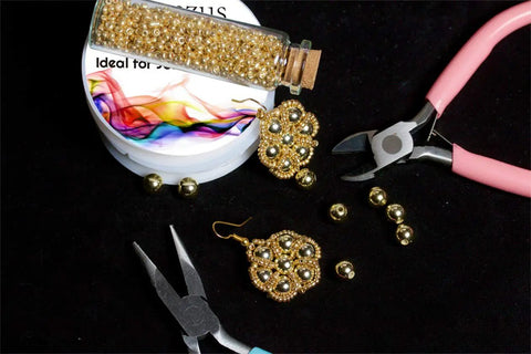 12 Rolls Tarnish Resistant Jewelry Wire Set For Beading And Jewelry Making In 12 Colors Including Silver Gold Rose Gold Bronze Red Rose Red Black Coffee Blue Purple Dark Green Green with tools and beads.