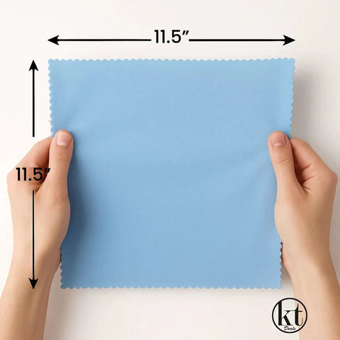 Person holding an 11.5 x 11.5 inch blue microfiber cloth from Large Microfiber Cleaning Cloths For Glasses And Screens Reusable Non Scratch
