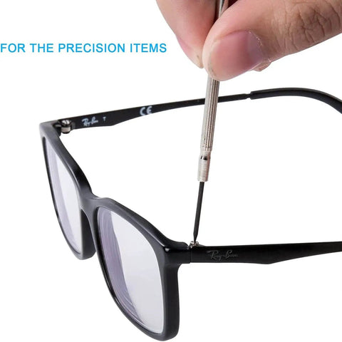 Adjusting eyeglasses with 11-Piece Mini Precision Screwdriver Set With Magnetic Tips For Jewelry, Watches, Eyeglasses, iPhone, Ring Doorbell, Toys And Electronics.