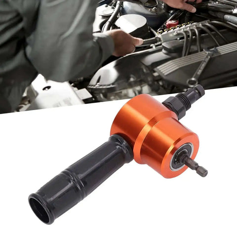 Double Head Sheet Metal Cutter Nibbler Tool With 360 Degree Adjustable Heads for auto repair use, shown with equipment and engine.