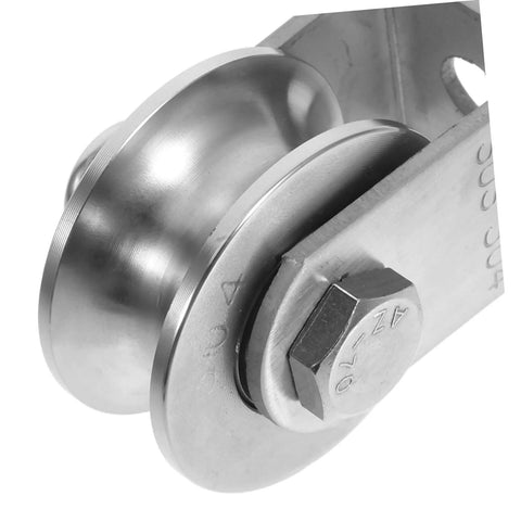 Close-up view of stainless steel industrial pulley wheel for cable guide roller heavy duty beefy roller ideal for door track and rolling gate systems.