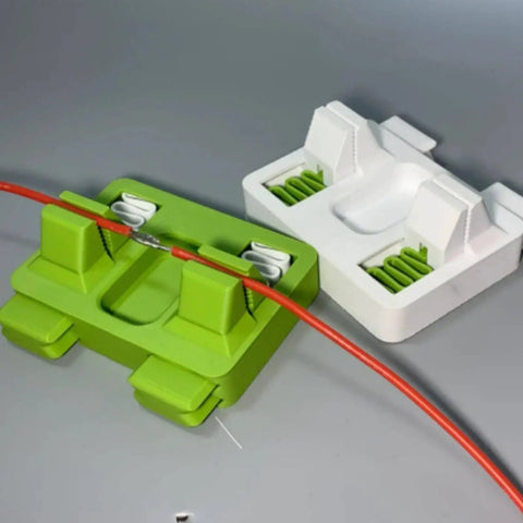 Nonslip Adjustable Soldering Aid Clamp Fixture For Precise Wire Welding And Soldering Jigs securing wire in green and white units.