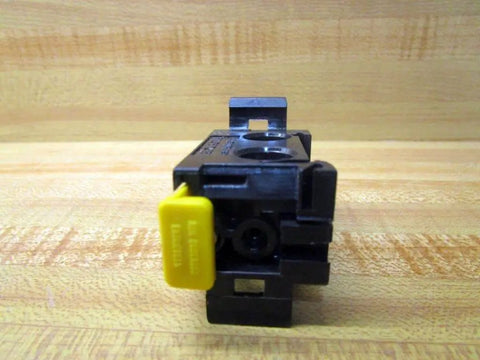 Front view of Manifold P-027050-00001 replacement for Bosch Rexroth systems with valve-mounting ports on wooden background