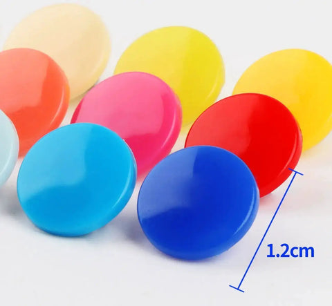 Colorful buttons from Snap Fasteners Kit With Pliers For Crafts And Cloth Diapers, 384 Sets In 24 Colors, Size 20 T5 Plastic Closures