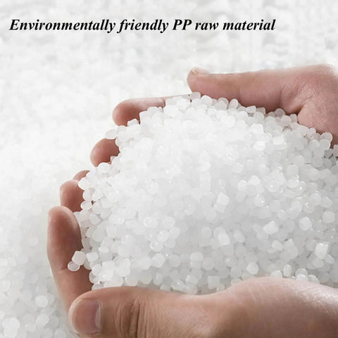 Hands holding environmentally friendly PP raw material pellets