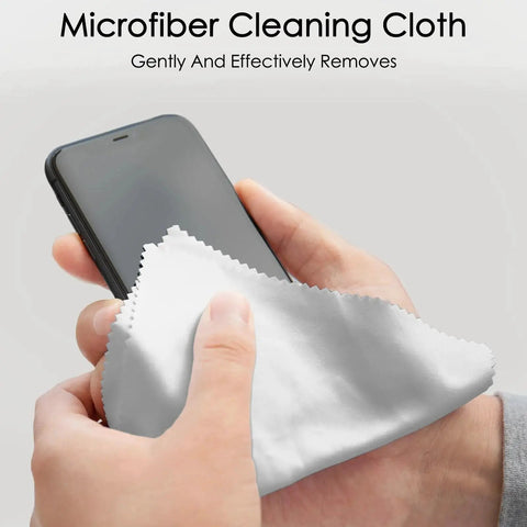 Person cleaning smartphone screen with white microfiber cloth, highlighting product use for 120 Pack Two Color Microfiber Cloths 7x6 Inch For Glasses Screens Cameras Phones.