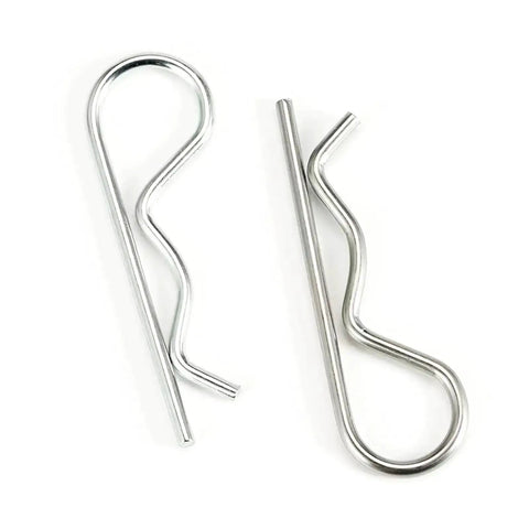 Close-up view of two stainless steel R clips from 4 Pack Heavy Duty Hitch Pins And R Clips Stainless Steel Cotter Pins For Trailers Tractors Mowers Carts And Trucks Large Spring Retaining Hair Pins M5x100mm Corrosion Resistant And Built To Last.