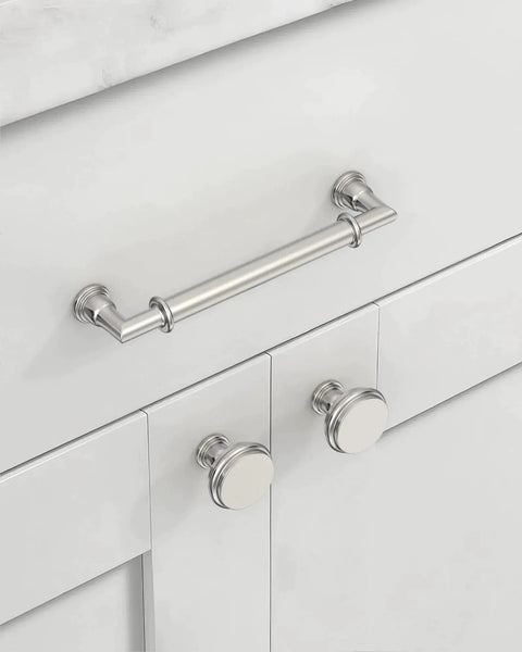 10 Pack 5 Inch Hole Center Cabinet Handles In Brushed Satin Nickel And Polished Nickel Finishes installed on white cabinet