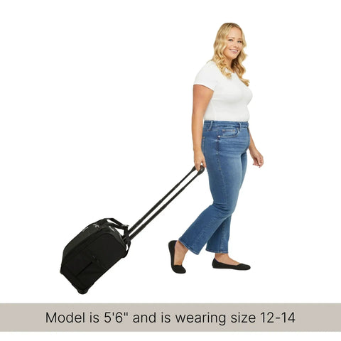 Woman pulling Ultra Lightweight 2 Wheel Underseater Carry On Luggage For Air Travel with telescoping handle, carry on size 15W 14.5H 9D.