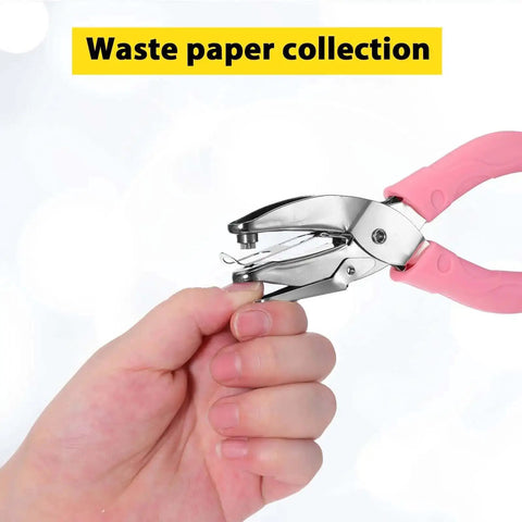 Hand holding Star Shaped Hole Puncher With Soft Grip Handle Metal Single Hole Punch For Crafts Scrapbooks And Tags in focus