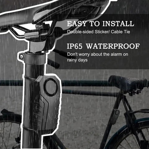 Beefy 113dB Wireless Bike Alarm With Remote Vibration And Motion Sensor IP55 Waterproof installed on bike handlebar in rain