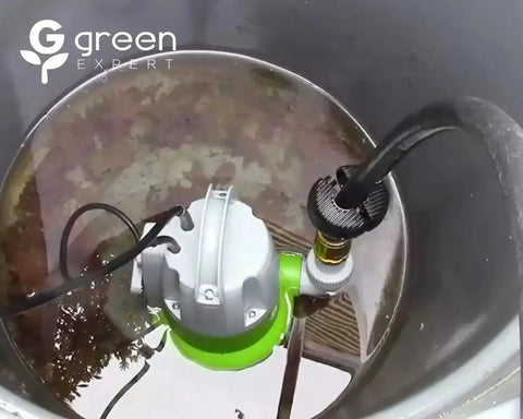 Top view of One Third HP Submersible Sump Pump With Flow Sensor Switch For Flooded Basements And Outdoor Spots in action in a flooded area