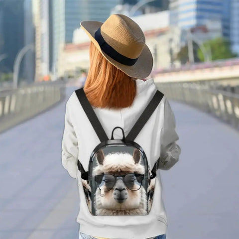 Back view of a woman wearing a Women Mini Backpack Purse With Alpaca Print Cute Small Daypack For Travel And Work on city street.