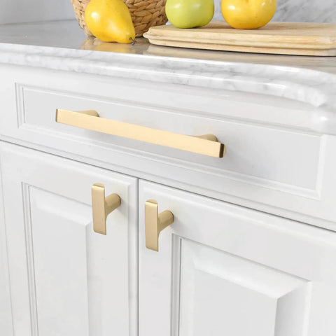 Brushed Gold Cabinet Pulls Pack Of 10, 5 Inch Hole Centers, Zinc Alloy And Brass Construction installed on white kitchen cabinets ZH0028