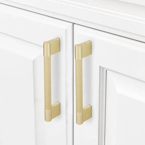 10 Pack Brushed Brass Knurled Cabinet Handles 5 Inch Center to Center 5.9 Inch Overall Length installed on white cabinets