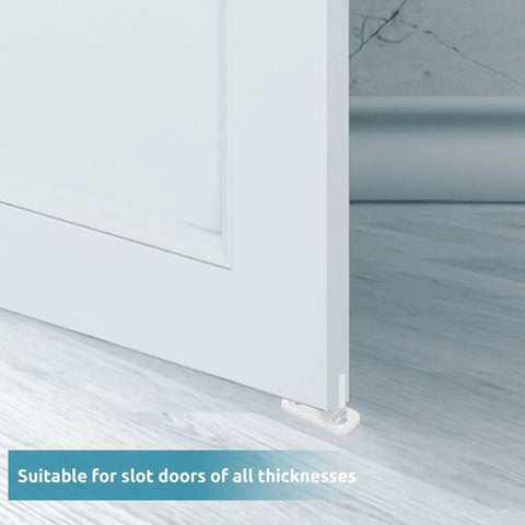 Eight Piece White Sliding Closet Door Floor Guides For Bypass And Pocket Doors Made From Durable POM Material Floor Mounted Barn Door Track Guides With Adjustable Height To Prevent Door Swing Includes Screws in use.