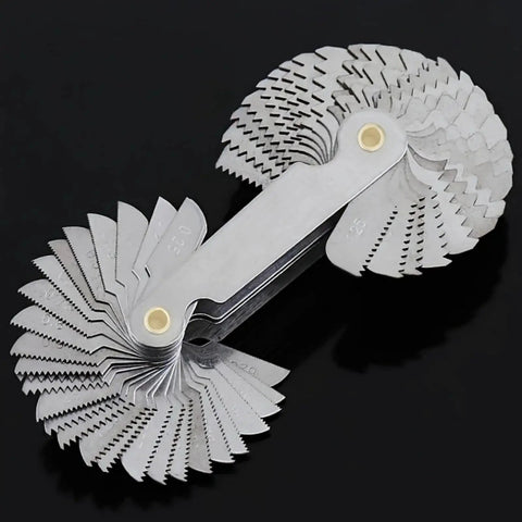 58 Piece Metric And Imperial Screw Thread Pitch Gauge Set showing stainless steel gauge blades on a black background