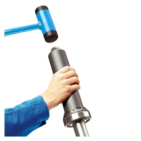 Person using Universal Bearing Install Kit TMFT36 Bearing Fitting Tool Kit for auto repair, holding impact-resistant tool.