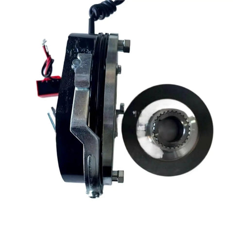 Electromagnetic holding brake assembly, side view, black housing with metal mounting flange.