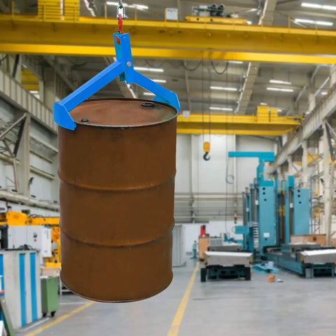 Vertical Drum Lifter Clamp For 55 Gallon Steel Drums 1100 Lb Capacity gripping a drum in a warehouse