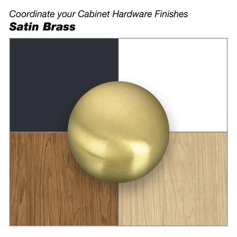 Satin brass cabinet knob on different wood finishes background for coordinating hardware.