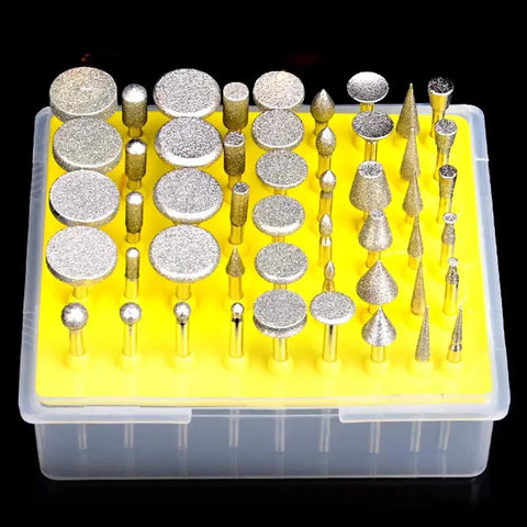Diamond Coated Grinding Head Set For Dremel Rotary Tool 50 Pcs arranged on a yellow tray, various shapes visible