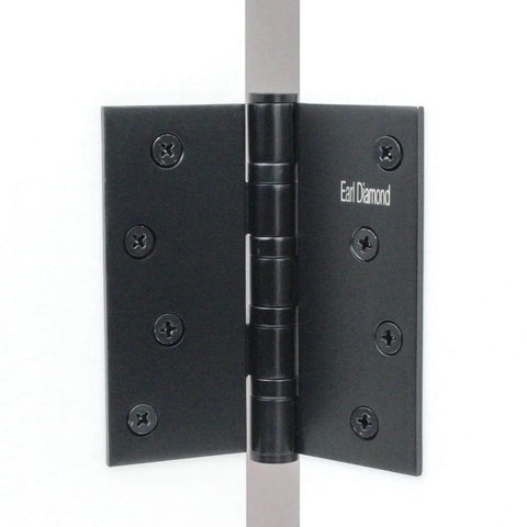 Installed 4-Inch 304 Stainless Steel Matte Black Door Hinges Set Of 2 with square corners for exterior and interior doors.