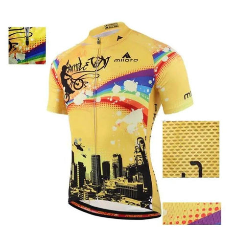 Yellow cycling jersey with urban skyline design, colorful accents, and bicycle graphic, featuring breathable fabric details.