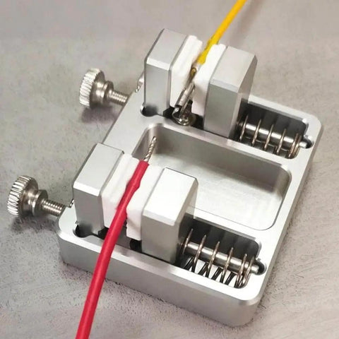 Pro Grade Soldering Station Wire Clamp Fixture Table For Stable Circuit Board Assembly shown clamping red and yellow wires