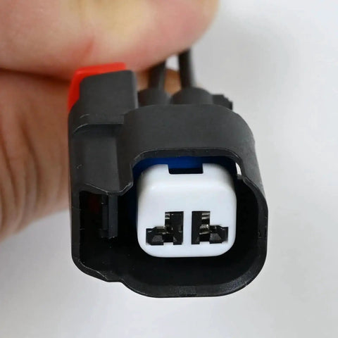 Close-up of Abs Wheel Speed Sensor Connector Pigtail Wiring Harness with black casing and visible connectors