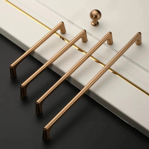 Four Champagne Bronze Cabinet Pulls 5 Inch Center To Center Pack Of 10 With Screws Included Kitchen Cabinet Handles on a white surface