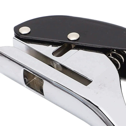 Close-up of Pro Grade Heavy Duty Single Hole Punch 6mm Round Metal Handheld Punch Tool For ID Badges with black handle.