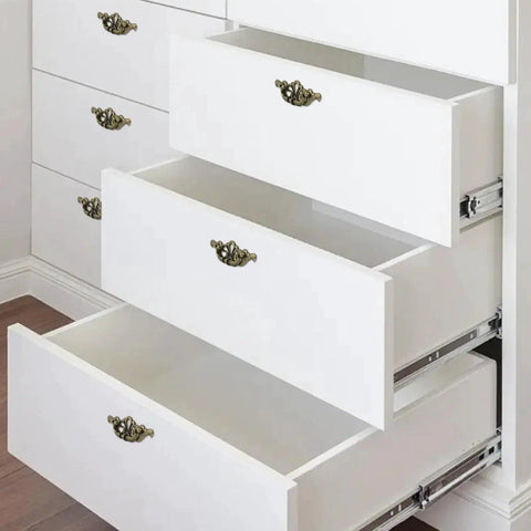 White dresser with open drawers displaying 2-Pack 6 Inch Antique Drawer Pulls With 3.43 Inch Hole Spacing Hollow Pattern Zinc Alloy Decorative Cabinet Handles