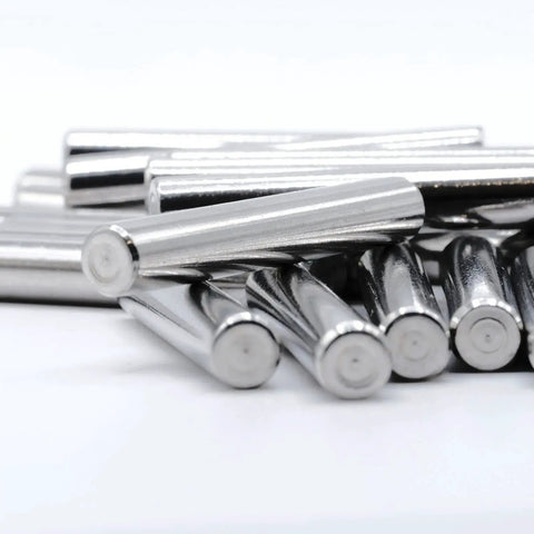 Close-up of steel Ivar Shelf Dowel Pins Replacement Pack Of 24 6x40mm Compatible With IKEA Part 101324 for bookshelf support.