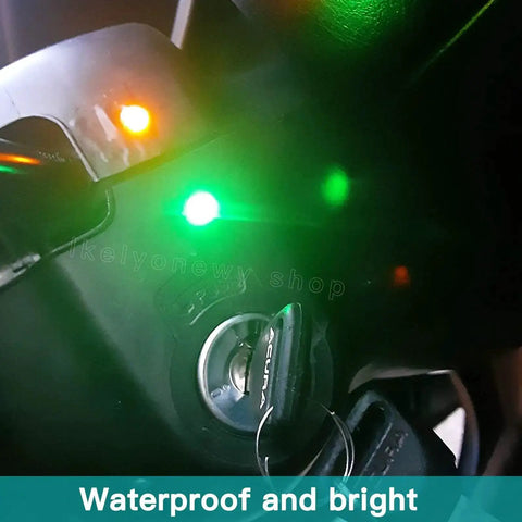 Waterproof 6mm LED Indicator Light 12V 24V prewired signal lamp in use on car dash showing green illumination