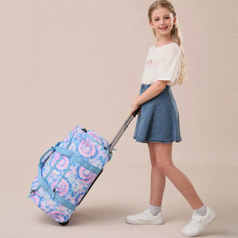 Girl pulling Girls Tie Dye Rolling Duffle Bag For Travel And Camping 22 Inch Purple Luggage With Wheels Hidden Shoe Pocket