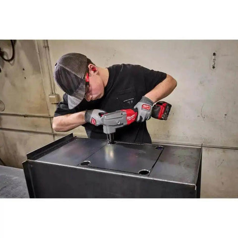 Person using 10 Gauge Nibbler With Variable Speed And Tool Free 360 Die Holder Rotation for clean cuts in mild steel