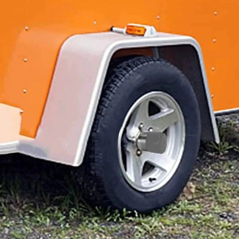 Trailer wheel with Beefed Up Trailer Wheel Bearing Protector Set 1.98 Inch Stainless Steel Bearing Protectors with dust cover cap.