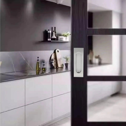 4 Pack 4.72 Inch Recessed Pocket Door Handles Brushed Nickel Stainless Steel Flush Pulls installed on a sliding barn door in modern kitchen