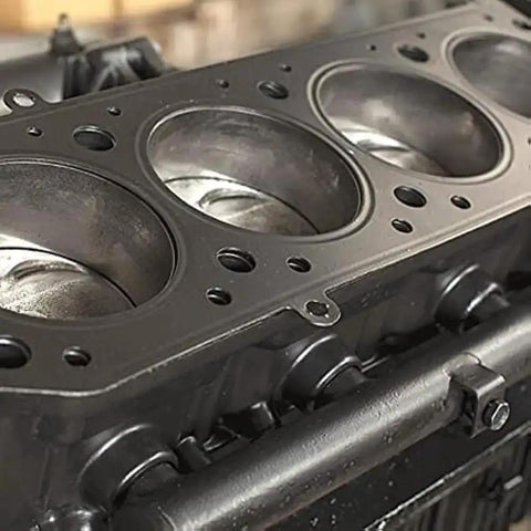 Close-up of an engine block part cleaned with Self Emulsifying Solvent Degreaser For Heavy Grease And Grime Cleanup, 5 Gallon Industrial Degreaser
