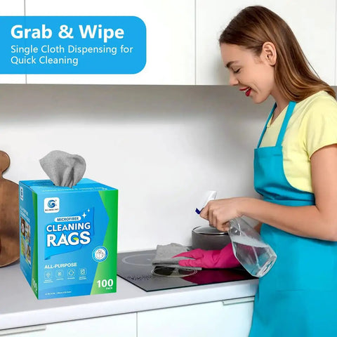 Woman using 100 Pack Microfiber Cleaning Cloths Dispenser Box Lint Free Ultra Absorbent Reusable Rags in kitchen for cleaning.